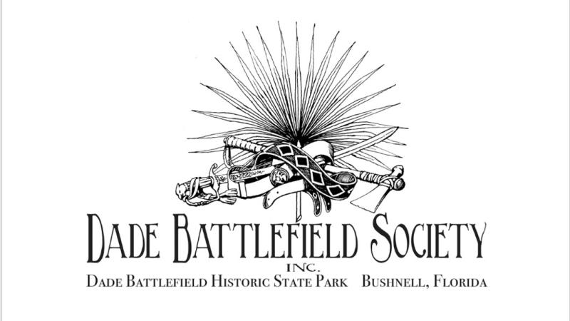 The Dade Battlefield Society logo features a musket, tomahawk and palmetto frond.